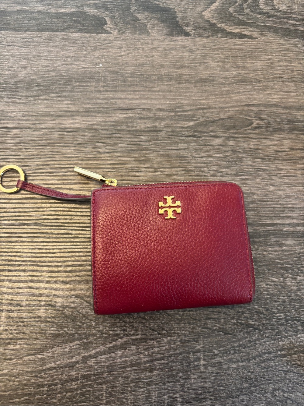 Tory Burch Burgundy Pebbled Leather Zip Wristlet with Gold Logo